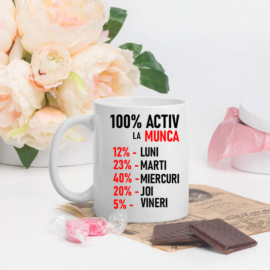 Cană cu mesaj: 100% activ la muncă, ceramică, albă